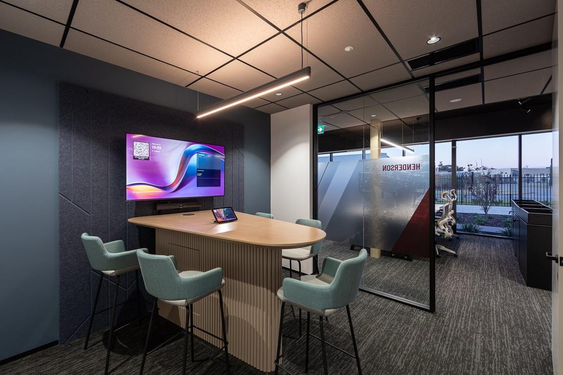 Glazed meeting room with acoustic panelling in the Pressure Dynamics office fitout, Perth