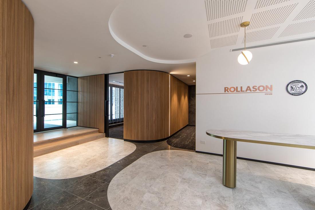Curved timber reception in the Rollason office refurbishment, Perth
